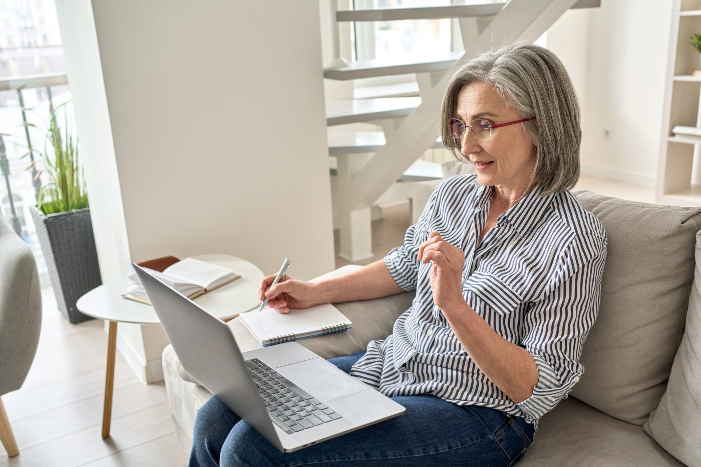 mature woman reviewing retirement plans